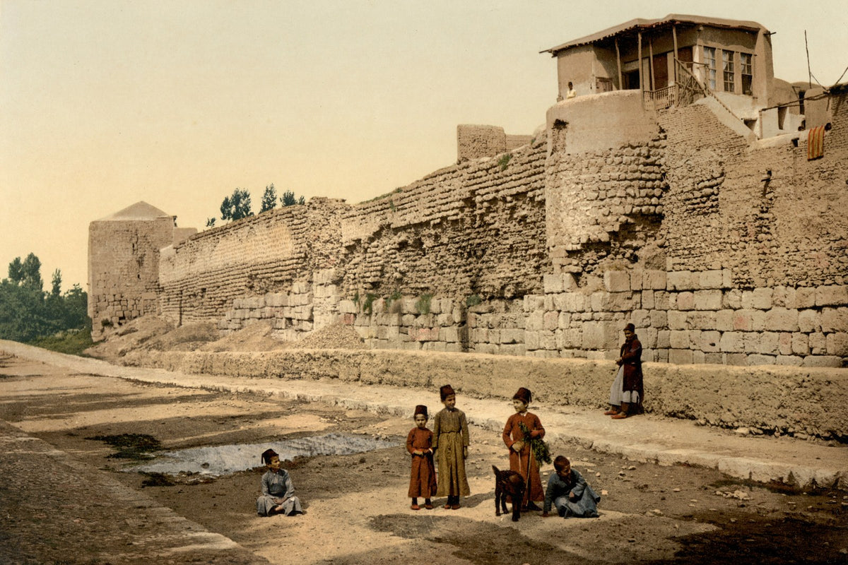 The city wall of Damascus, shown to travellers in the 1890s as the wall over which Paul was lowered in a basket, a house with its windows built right into the top