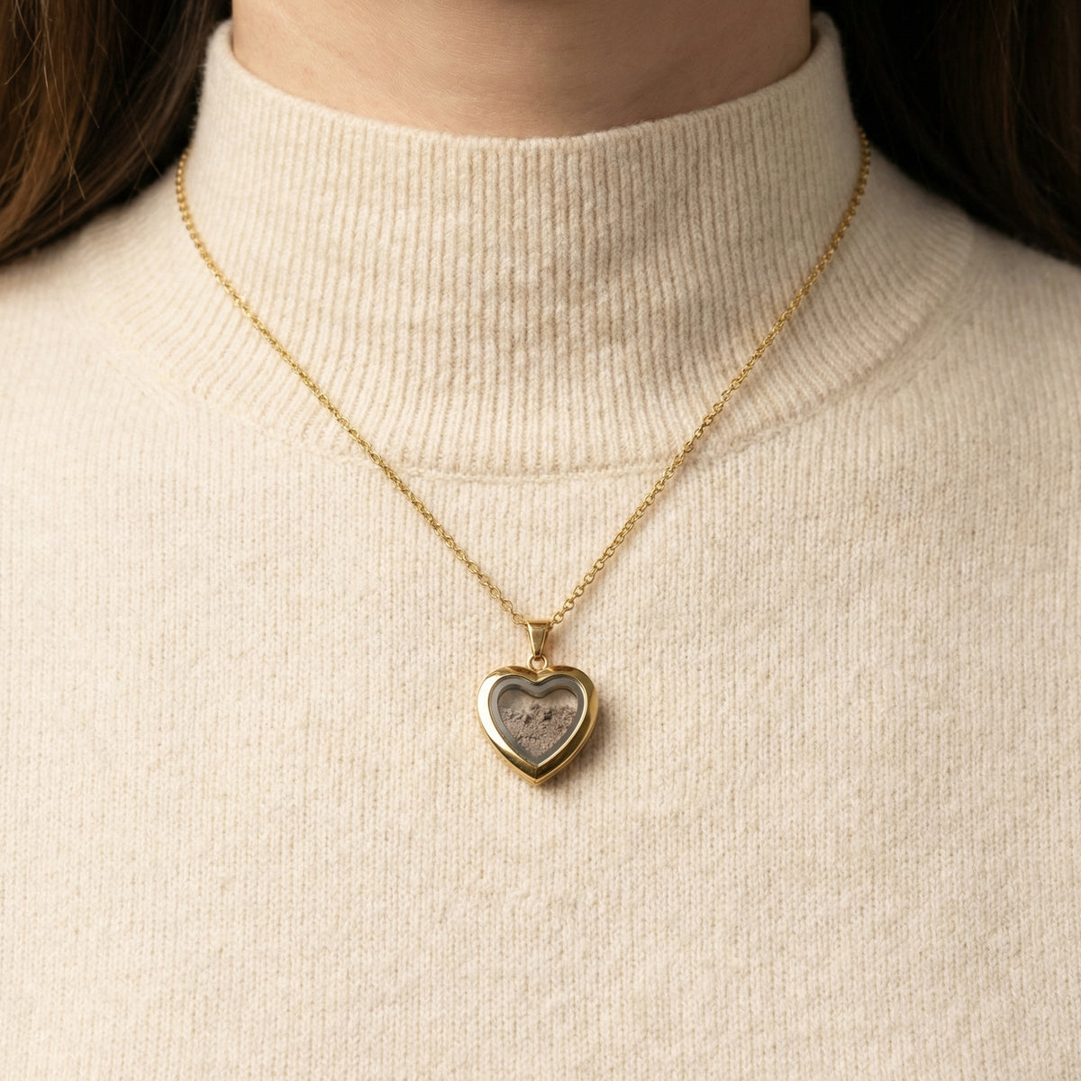 Heart pendant necklace holding Temple Mount soil
