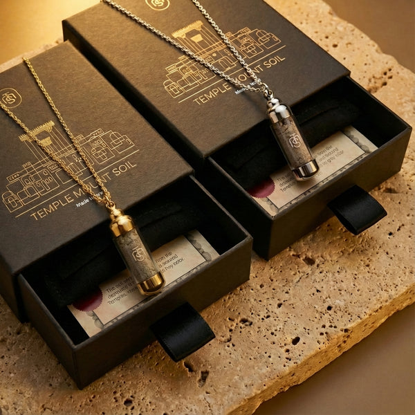 Two Temple Mount soil pendants with their packaging