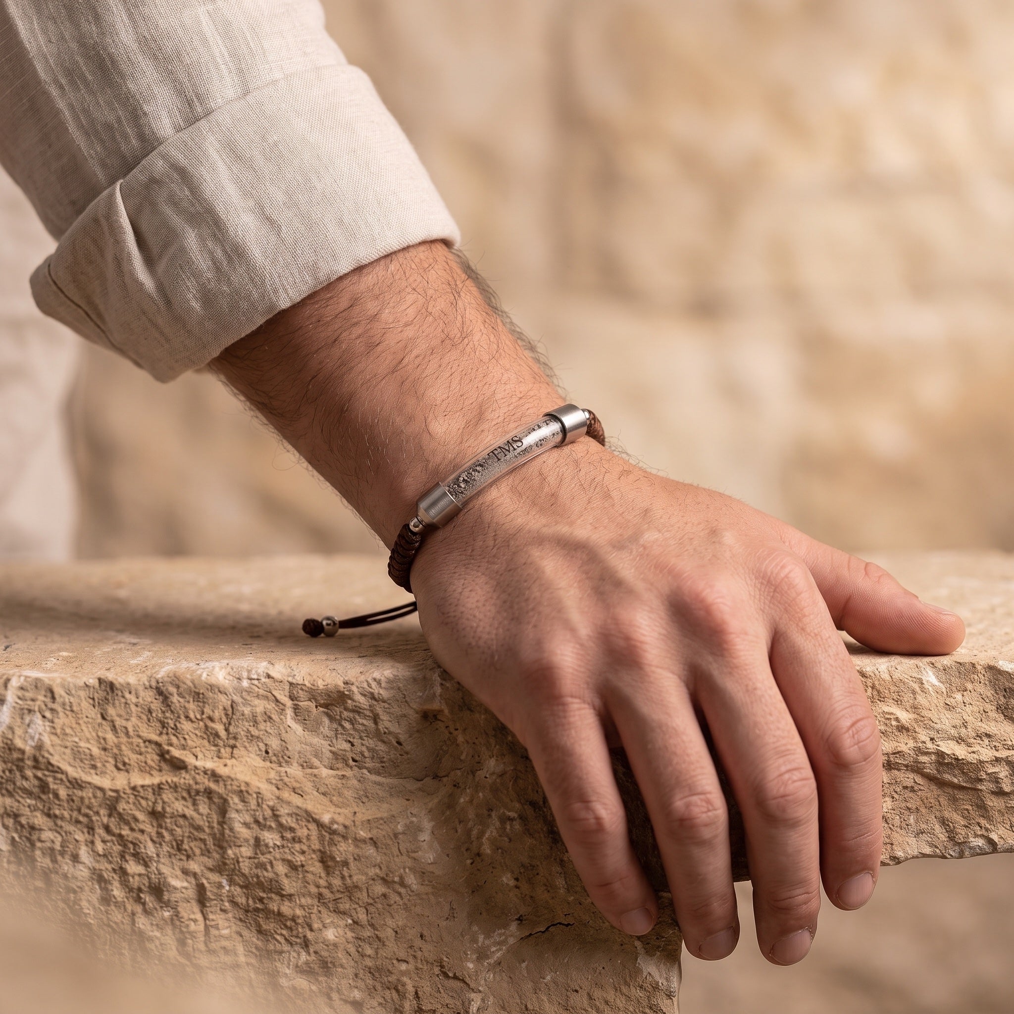 Brown Covenant Soil Bracelet worn on a man's wrist