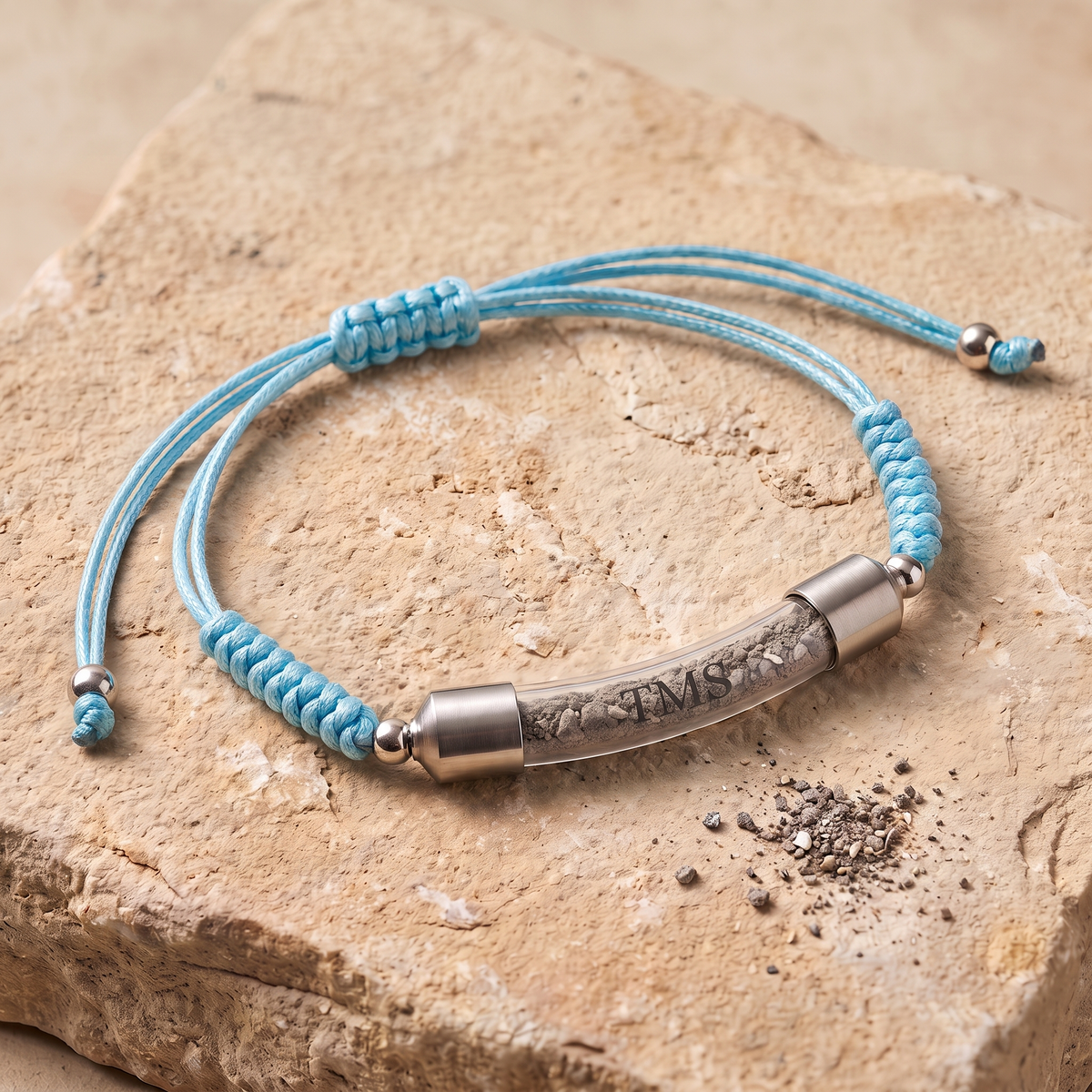 Covenant Soil Bracelet in blue with brushed steel caps, glass capsule filled with Temple Mount soil