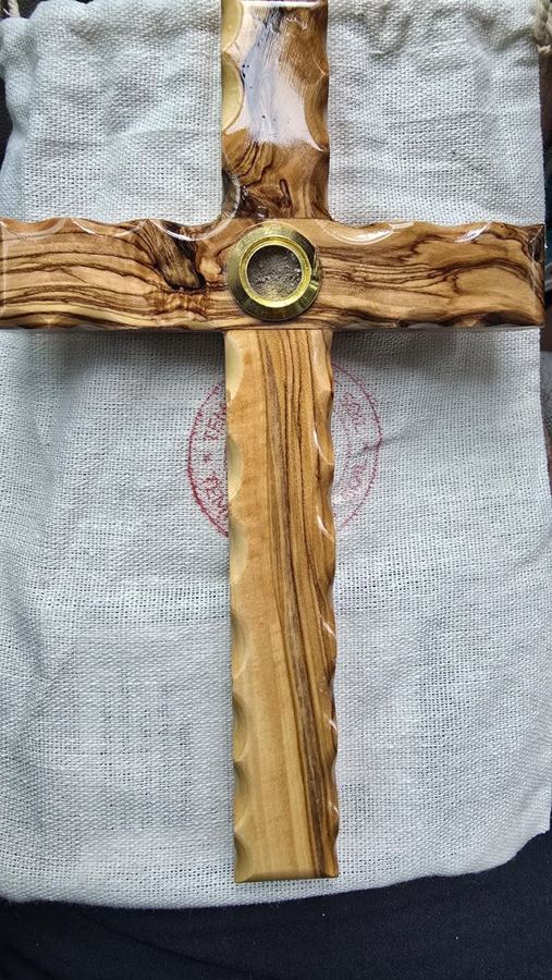Customer photo of the cross on its linen bag