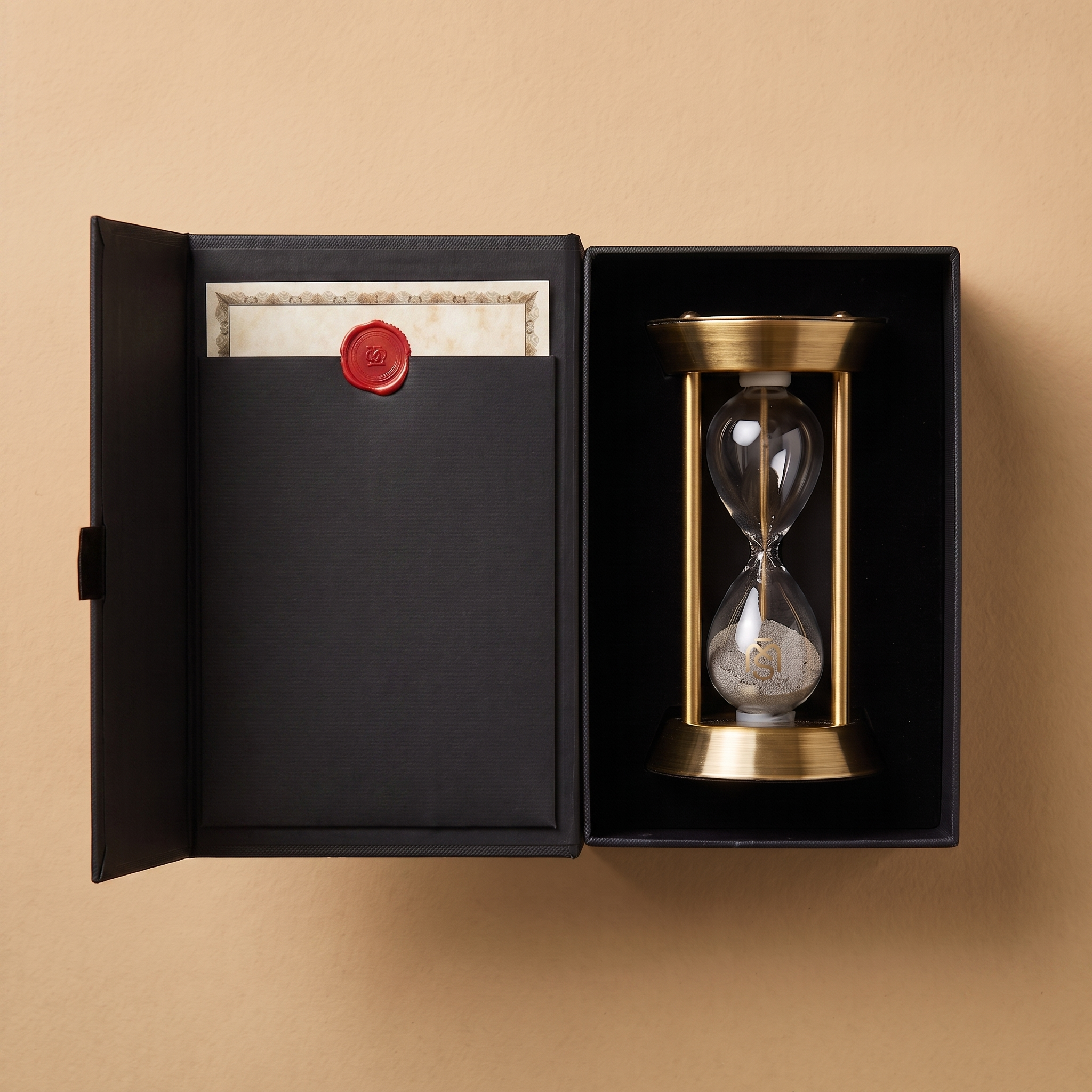 Open black presentation box with numbered Certificate of Authenticity and the Temple Mount Hourglass
