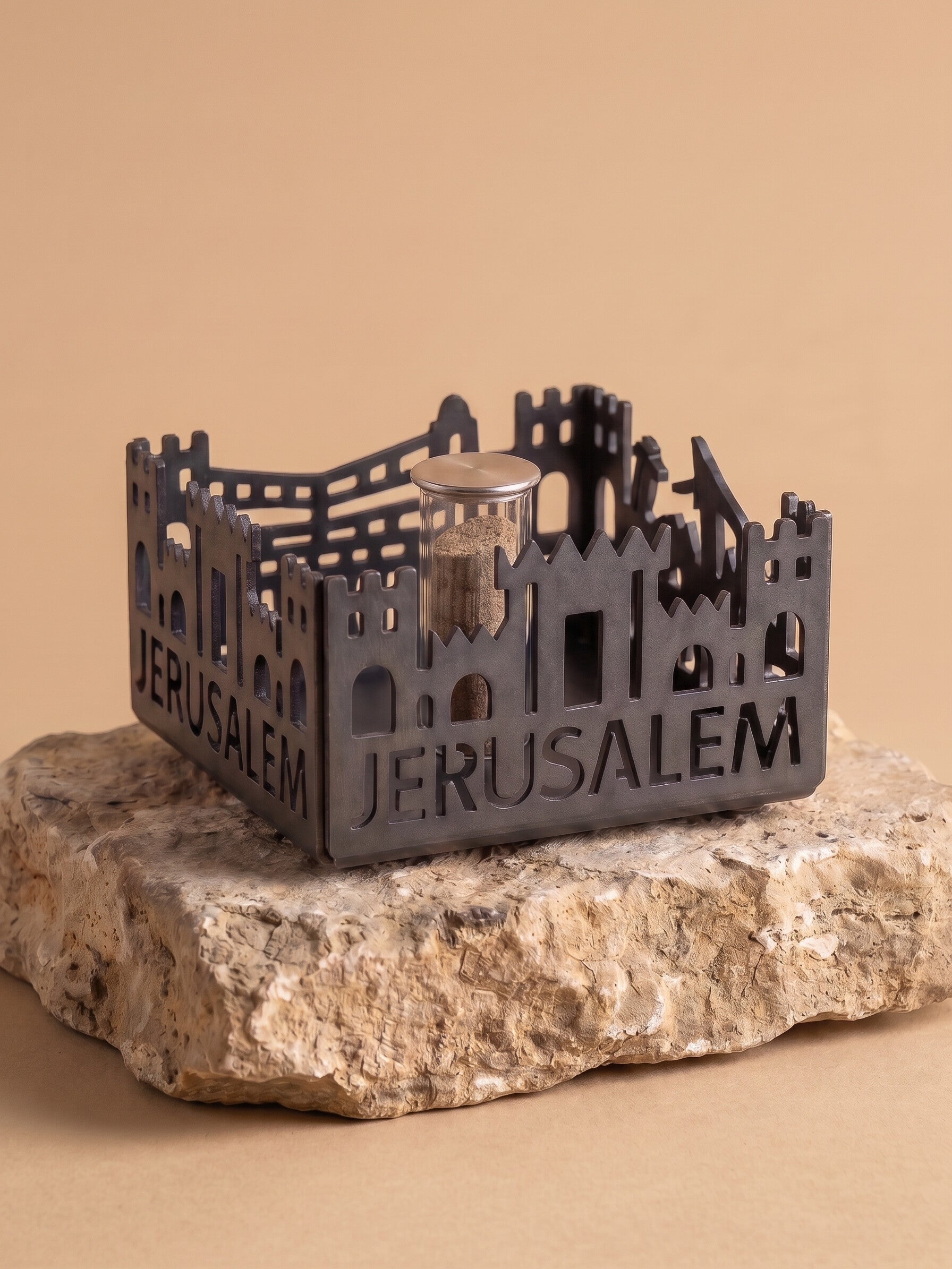 Jerusalem of Gold in matte black with JERUSALEM cut through the Old City wall