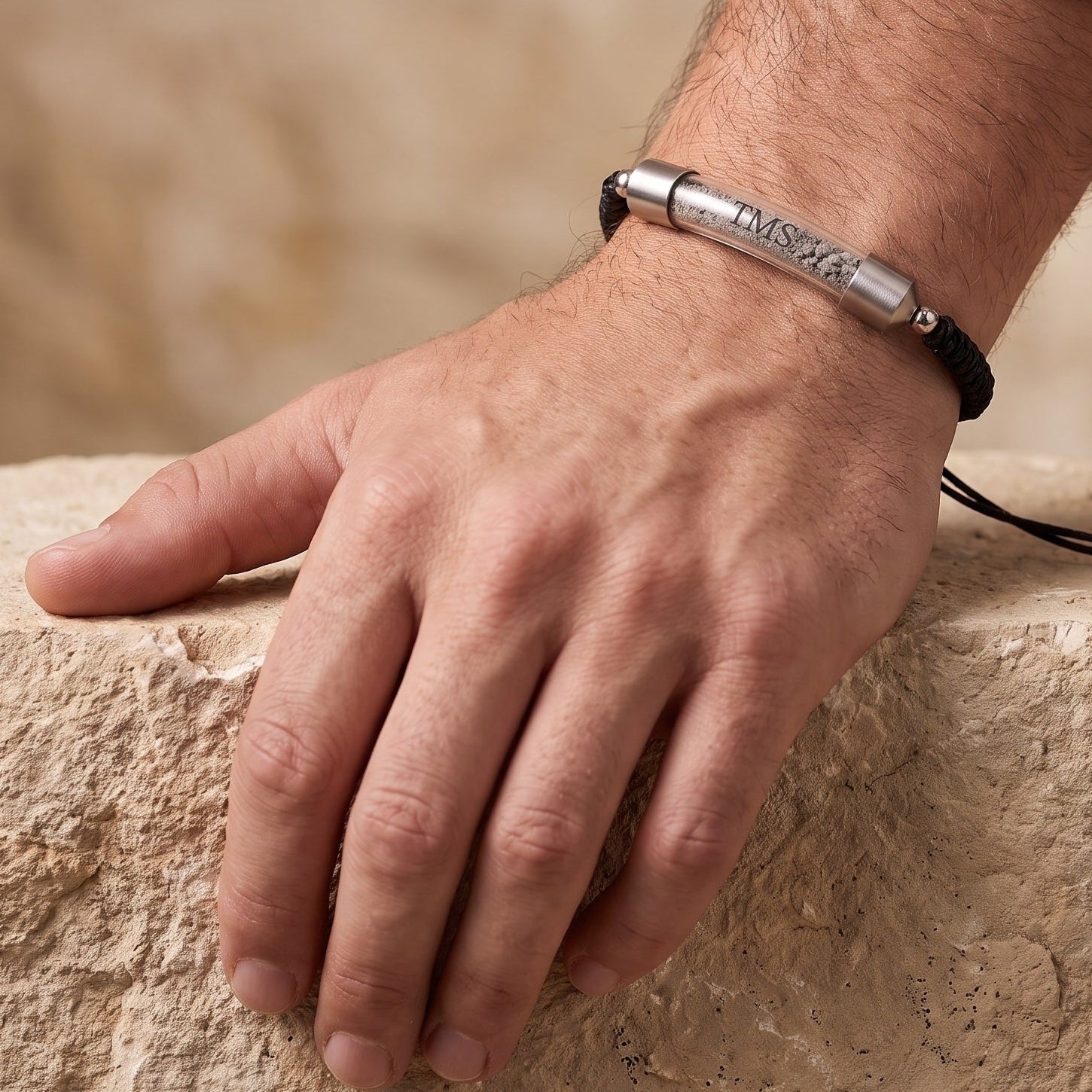 Black Covenant Soil Bracelet worn on a man's wrist